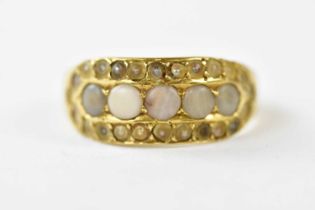 A Victorian 18ct yellow gold seed pearl set dress ring, size M, approx weight 4.4g.