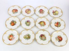 KPM; a collection of twelve hand painted porcelain plates, each decorated with fruit to the