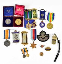 A WWI medal pair, and miniatures, British War Medal and Victory Medal awarded to Private T.