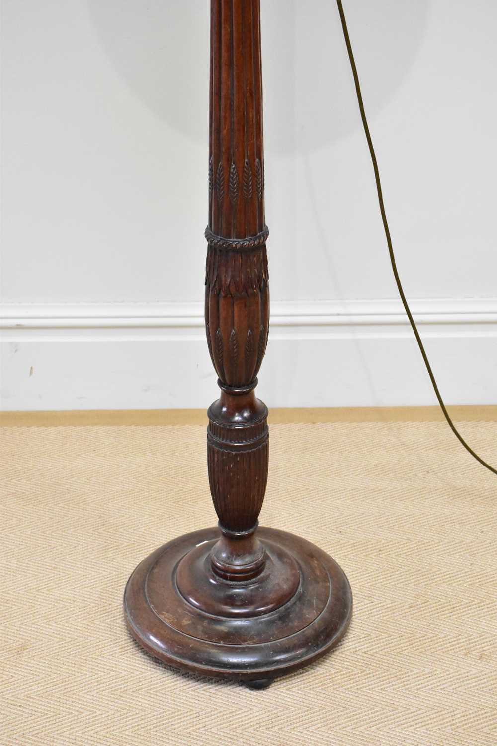 An early 20th century carved standard lamp with floral and fluted decoration, height 144cm. - Image 2 of 2