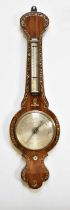 A 19th century mother of pearl inlaid wheel barometer, the silvered dial signed F.S Granger,