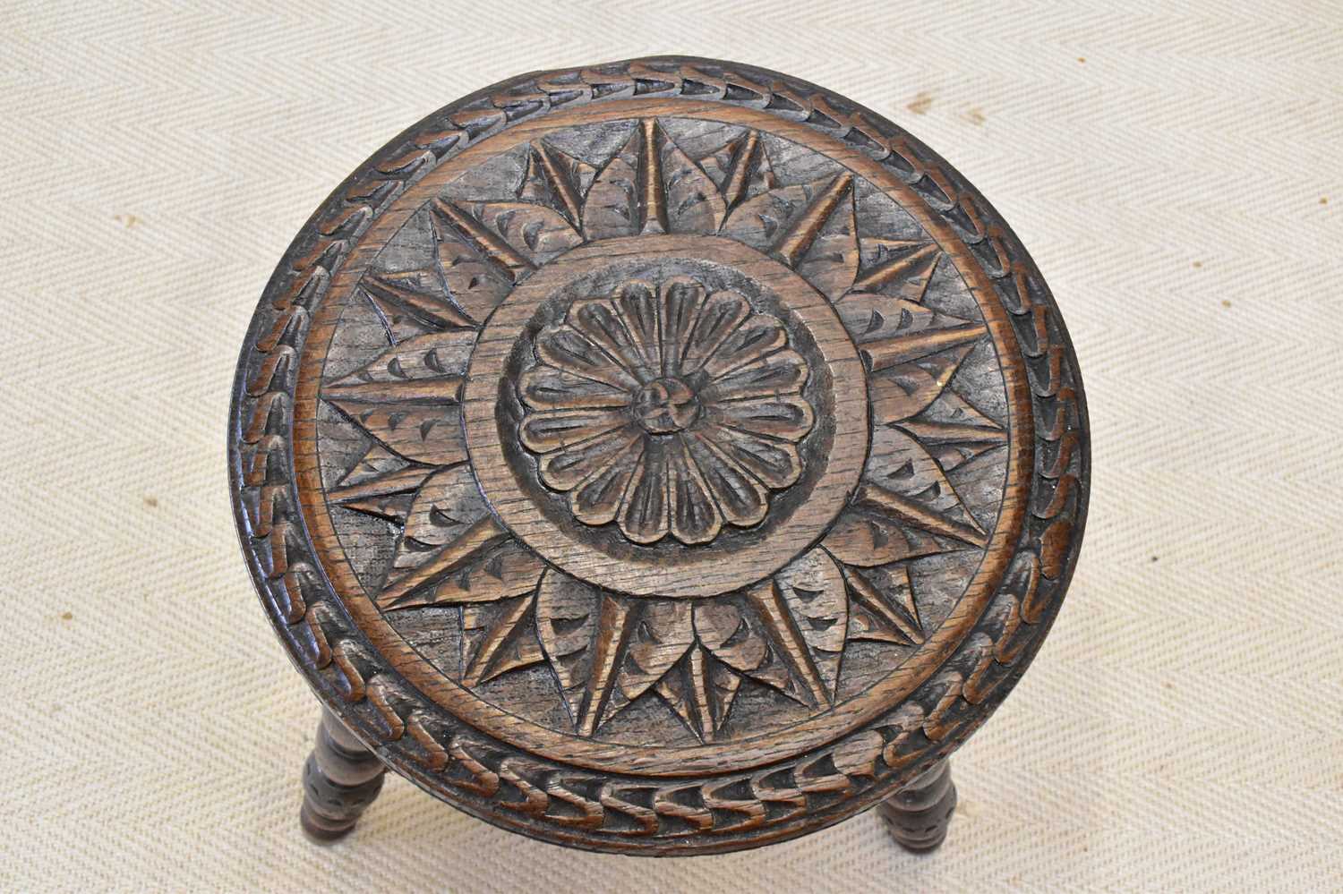 A 19th century carved oak stool, height 50cm, diameter 31cm. - Image 2 of 2