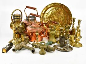 A collection of metalware including brass weights, copper kettles, brass kettles, brass