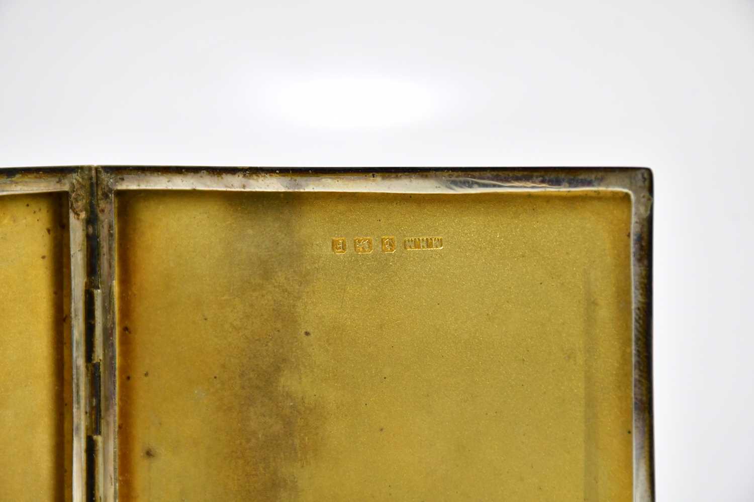M H MAYER LTD; a George V hallmarked silver cigarette case of rectangular form with engine turned - Image 4 of 4