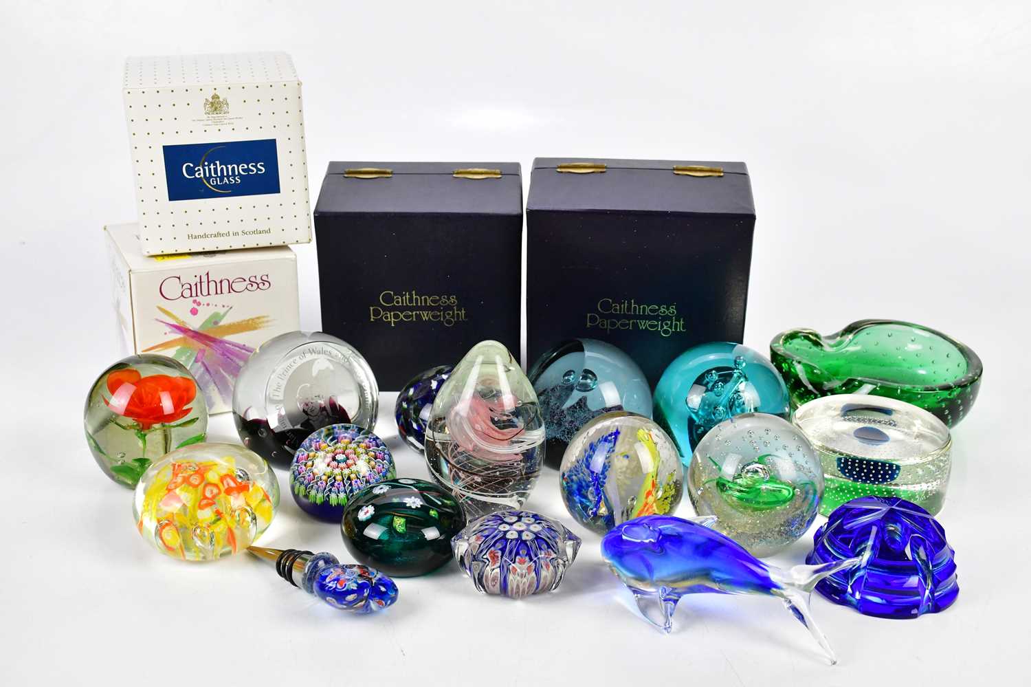 A collection of paperweights including Caithness examples, a Whitefriars bubble glass bowl, etc.