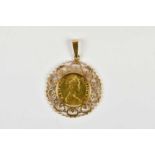 An Elizabeth II Isle of Man half sovereign 1974, in 9ct pendant mount, total weight 5.8g.