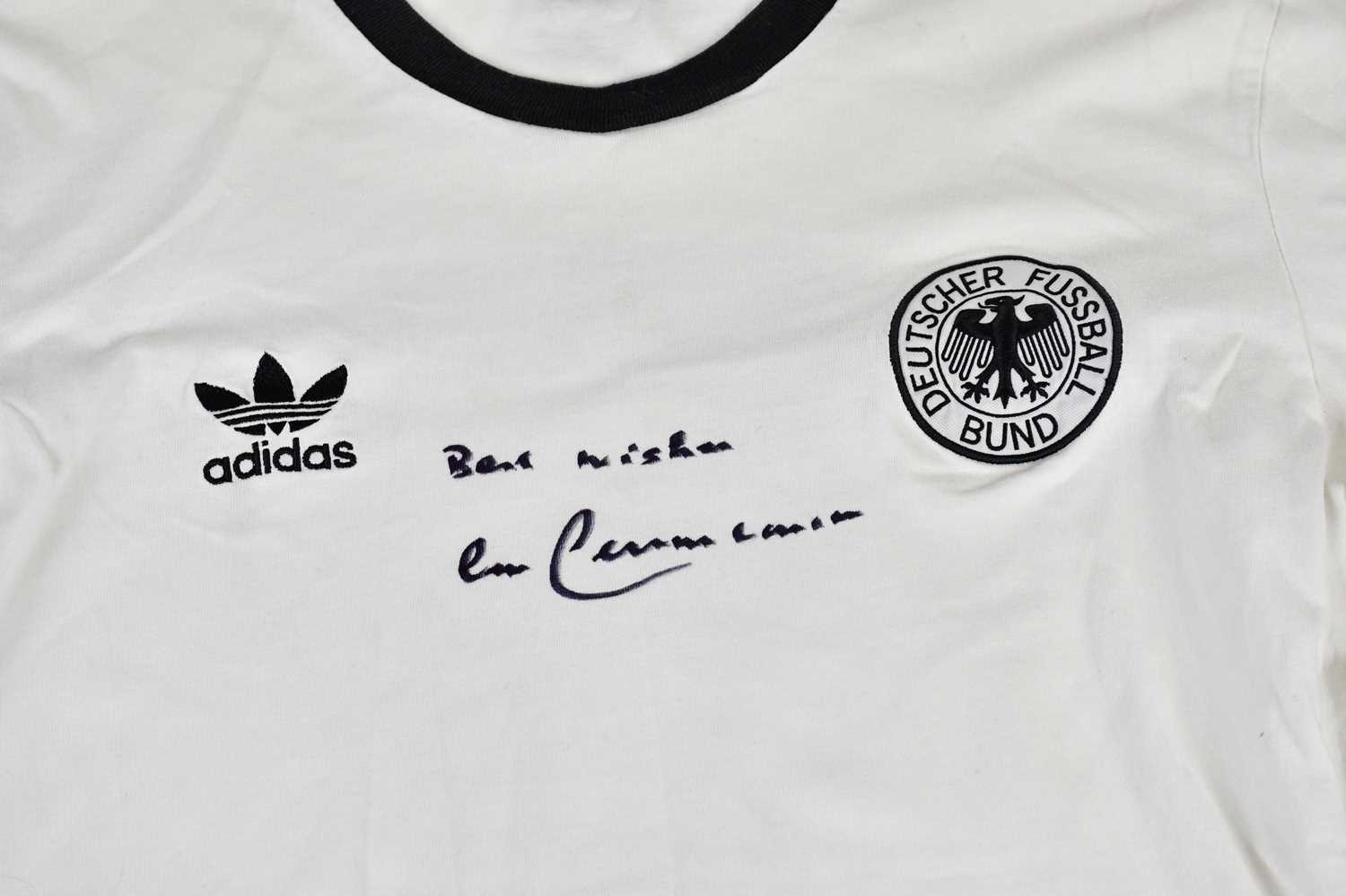 BECKENBAUER; a signed Germany retro style football shirt, signed to the front, size L. Condition - Image 2 of 3