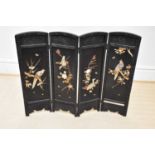 An early 20th century Japanese lacquered four division folding screen, height 90cm, width when