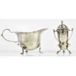 HORACE WOODWARD & CO LTD; a George V hallmarked silver cream jug, London 1912, together with a