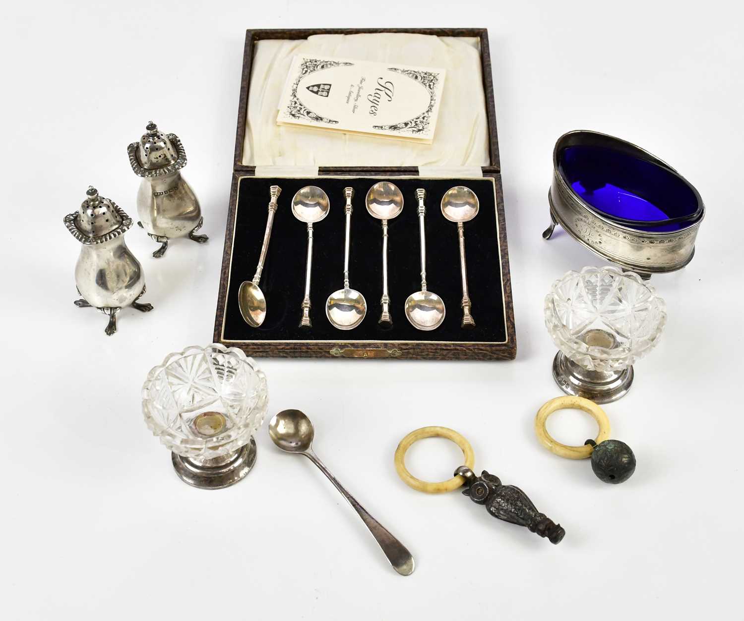 A George III hallmarked silver oval salt, London, 1815, with two condiments and a set of six