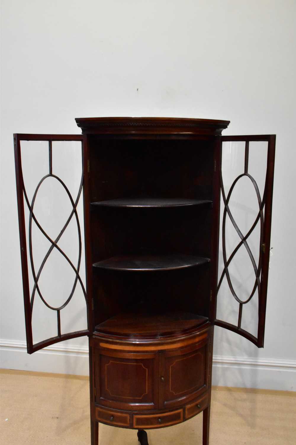 An Edwardian satinwood inlaid mahogany bowfront corner display cabinet, with two astragal glazed - Image 2 of 3