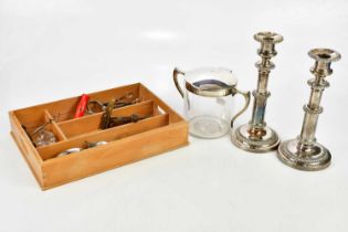 A pair of 19th century Sheffield plate tapering candlesticks, a biscuit barrel with silver plated