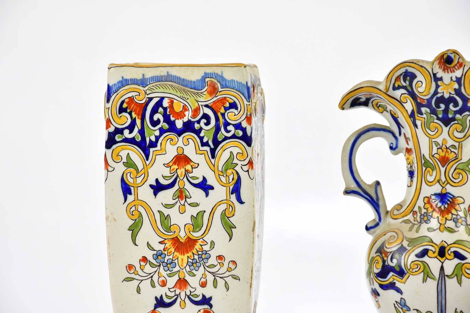 ROUEN; a pair of French faiance ware vases with moulded and painted floral detail, height 21cm, - Image 2 of 6