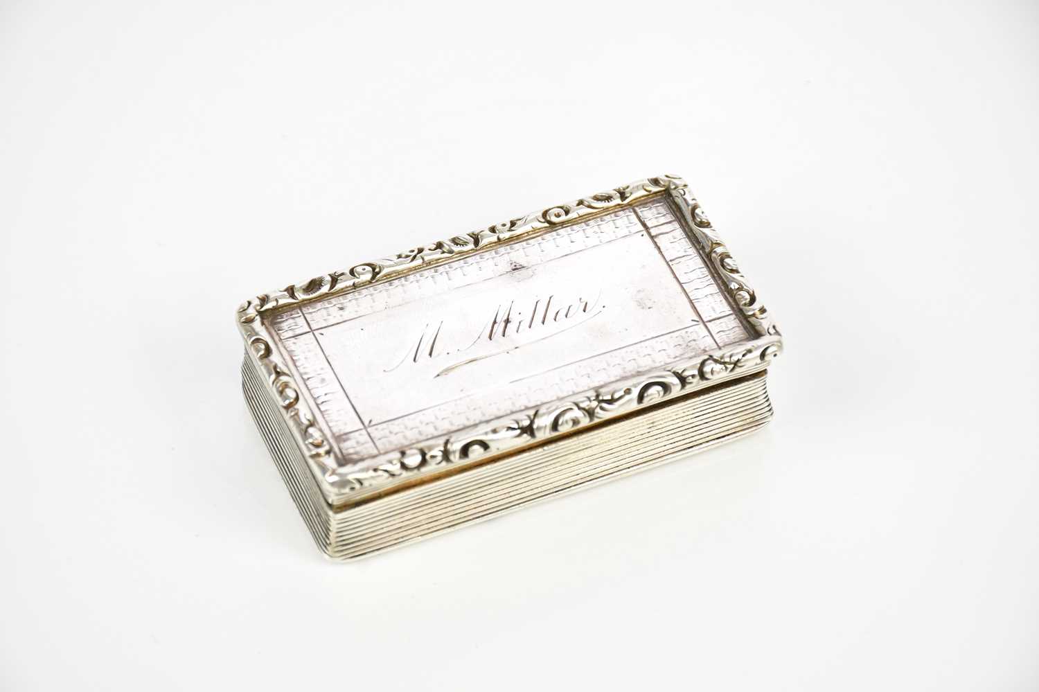 FRANCIS CLARK; a Georgian hallmarked silver snuff box inscribed 'M. Millen', Birmingham 1834, approx