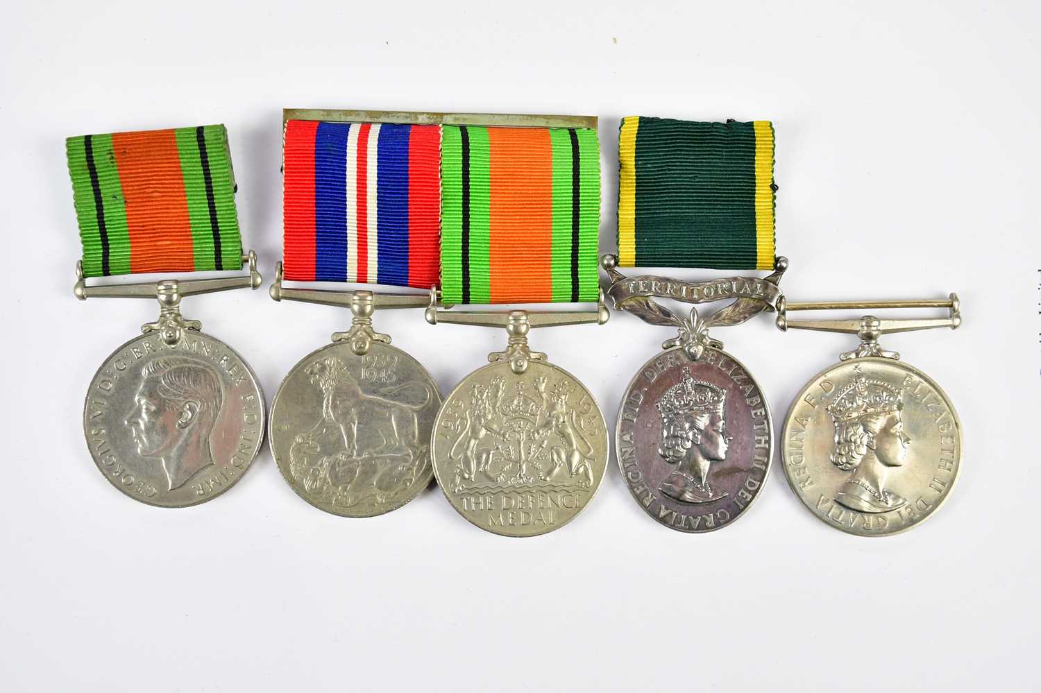 A small collection of medals comprising a Territorial Medal named to W/363188 Sergeant V