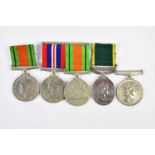 A small collection of medals comprising a Territorial Medal named to W/363188 Sergeant V