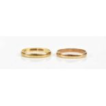 Two 9ct yellow gold wedding bands, approx size P, combined approx 2.8g.