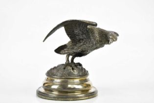 A 19th century spelter inkwell in the form of an eagle, on electroplated base, height 16cm.