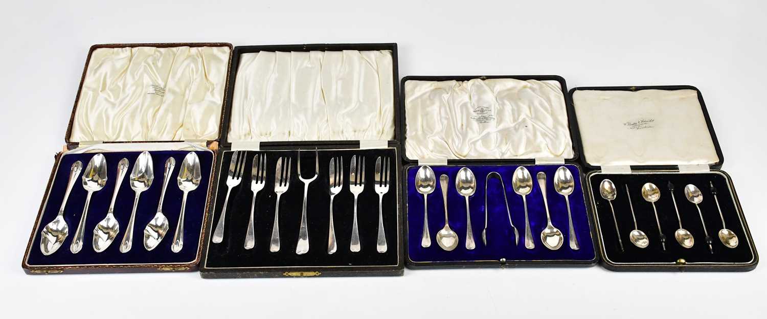 THOMAS BRADBURY & SONS; a set of six hallmarked silver grapefruit spoons, Sheffield 1927, with a set