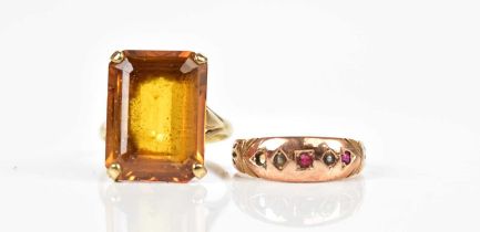 A 9ct yellow gold dress ring, size L, together with a further 9ct yellow gold dress ring, size M,