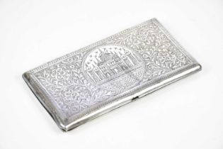 An Indian white metal cigarette case of rectangular form with chased decoration depicting temple