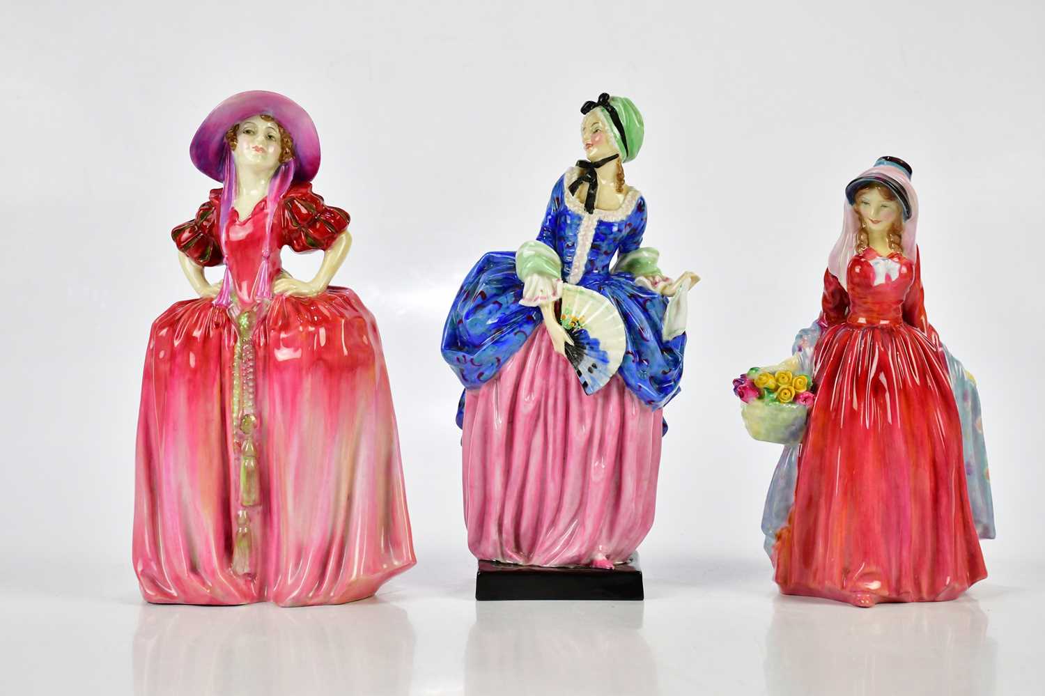 ROYAL DOULTON; three figures comprising HN1818 'Miranda', height 20cm, HN1567 'Patricia' and