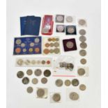 A collection of predominantly British coins including commemorative crowns, various threepence