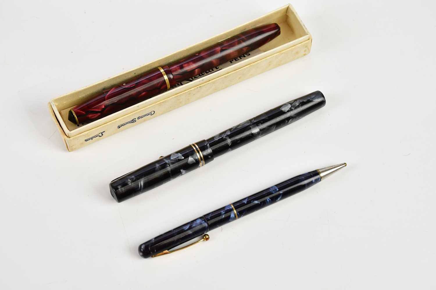 A Conway Stewart 15 fountain pen, in box, with a Swan fountain pen, a ball point pen (3)