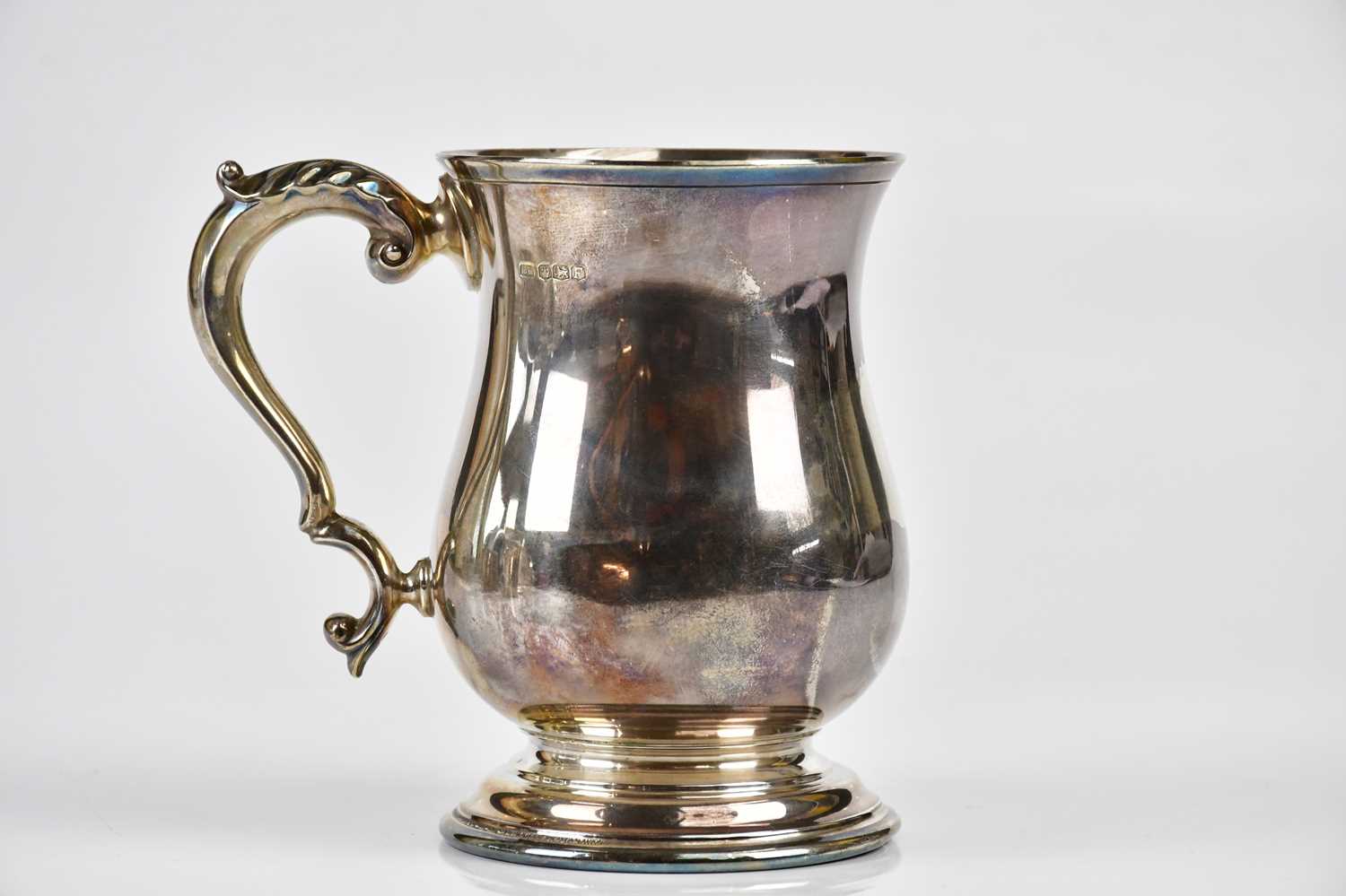 H H; a George VI hallmarked silver baluster mug, Sheffield 1948, height 13.5cm, approx weight 10.