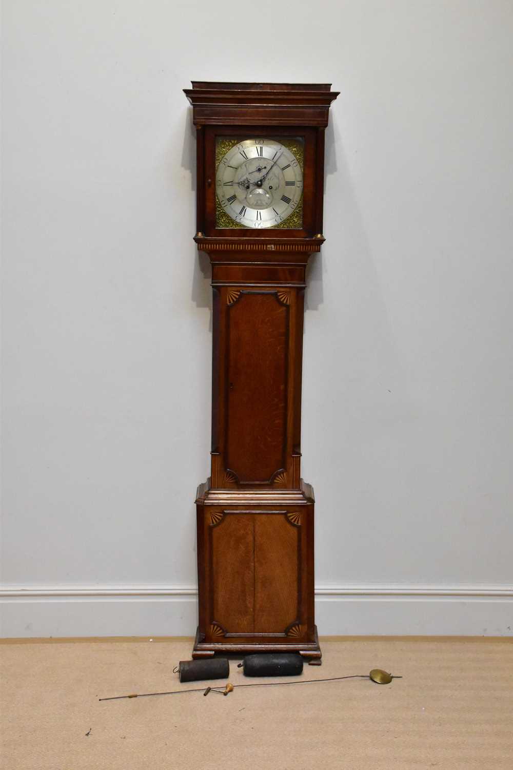 A late George III inlaid oak eight day longcase clock, with Roman numeral chapter ring, subsidiary