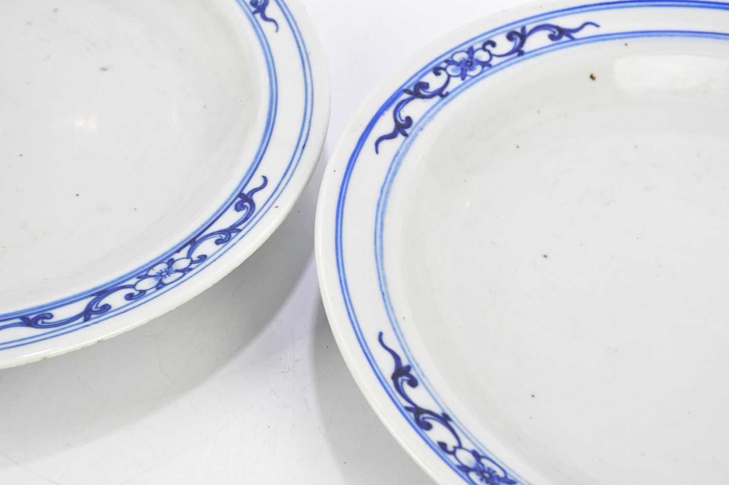 A pair of 20th century Japanese blue and white circular plates, diameter 38cm. - Image 3 of 6