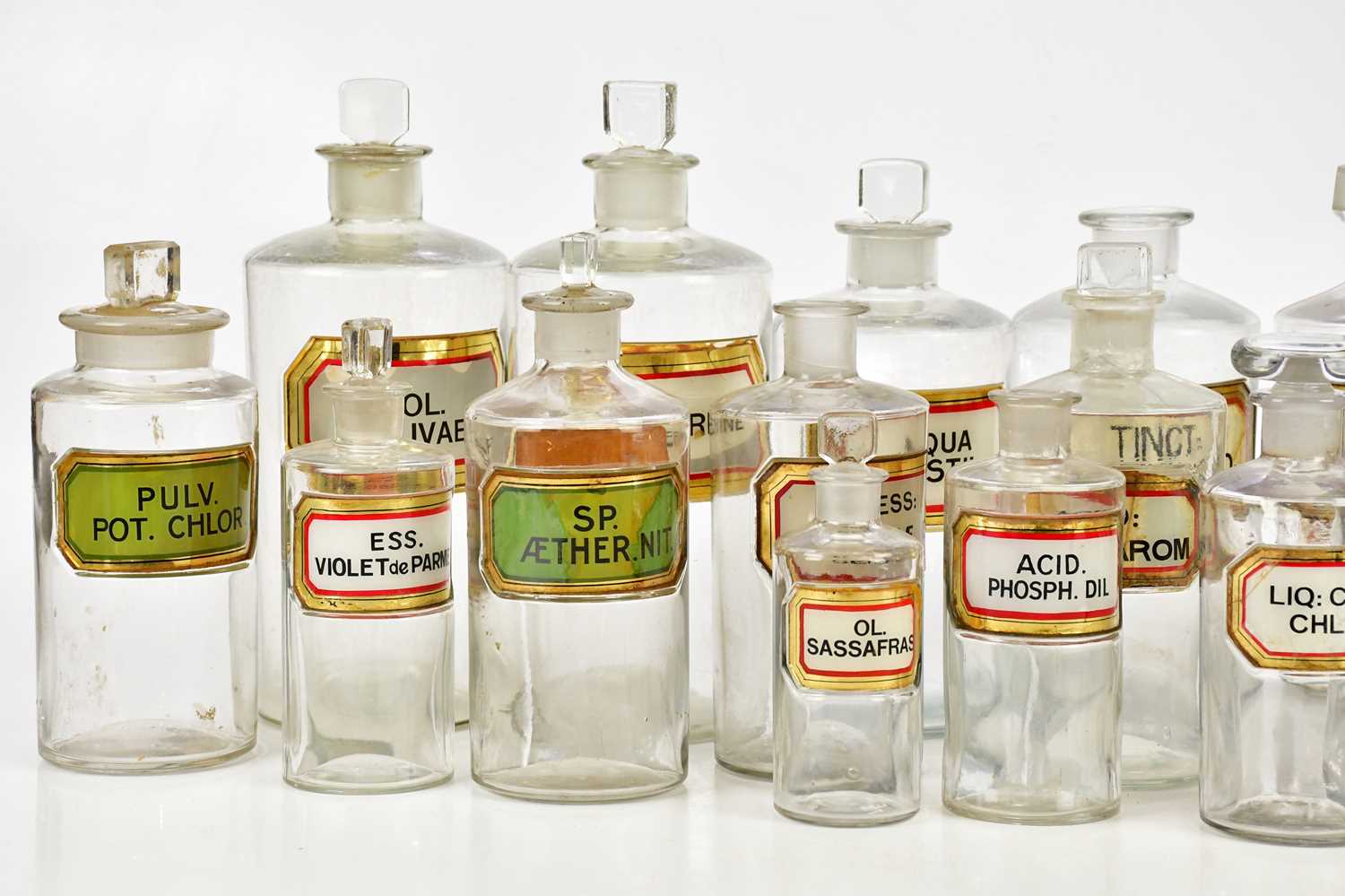 A collection of Victorian and later clear glass pharmaceutical bottles with glass labels, height - Image 2 of 3