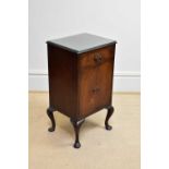 An early 20th century mahogany bedside cabinet with one drawer above two cupboard doors, height