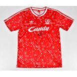 KENNY DALGLISH; a signed Liverpool retro style football shirt, signed to the front, size L.