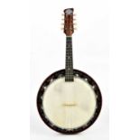 JOHN GREY & SONS; a cased banjo.