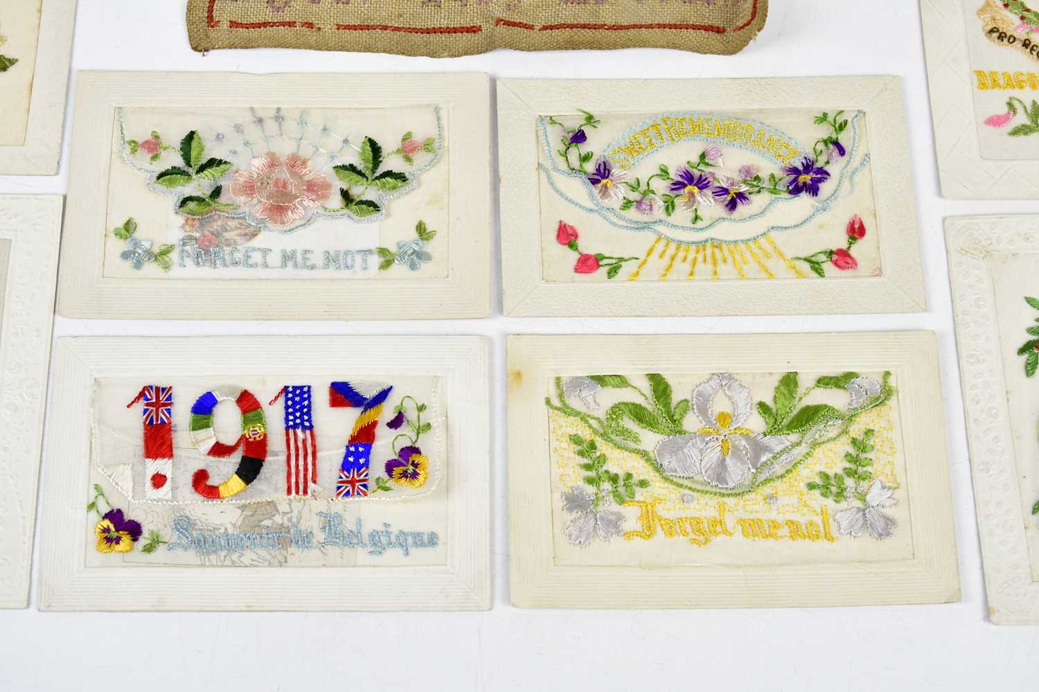 A 19th century alphabet sampler together with a mixed collection of WWI postcards. - Image 4 of 5