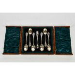 WALKER & HALL; a cased set of six Victorian hallmarked silver tea spoons and sugar tongs,