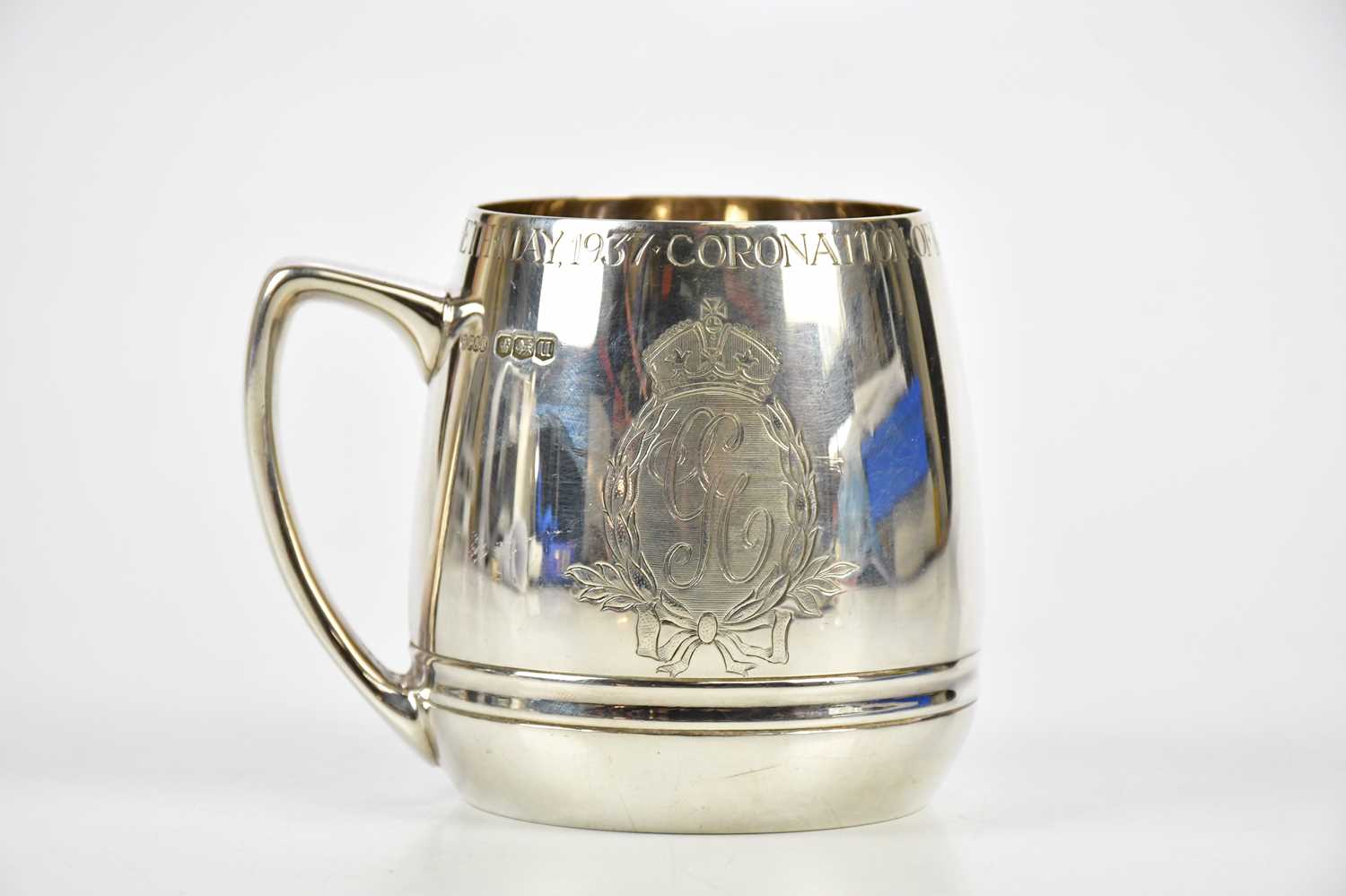 H PIDDUCK & SONS; a George VI hallmarked silver Royal commemorative mug, Sheffield 1937, approx 11.