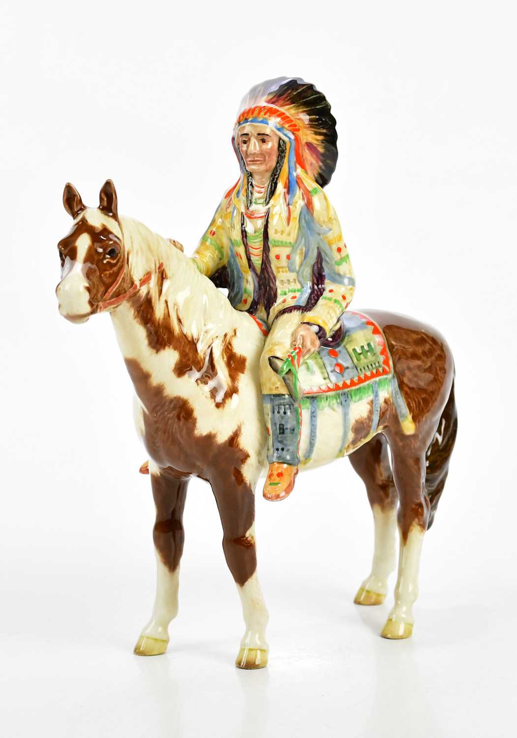 BESWICK; a native American upon a horse, height 21cm.