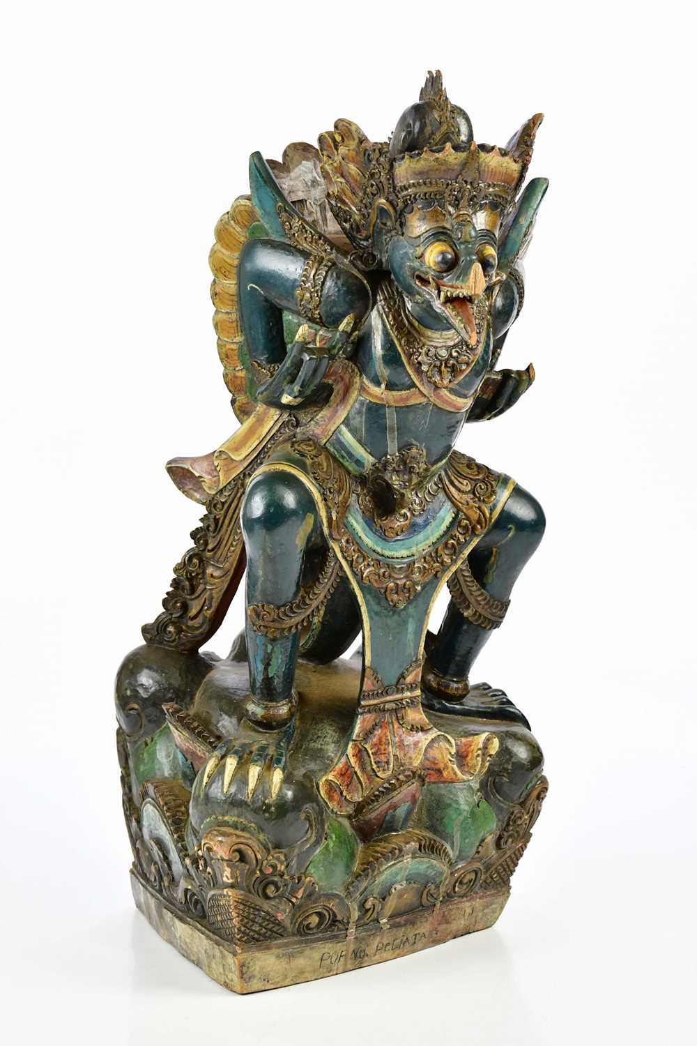 An Indian carved wooden sculpture of a Garuda eagle, height 53cm.