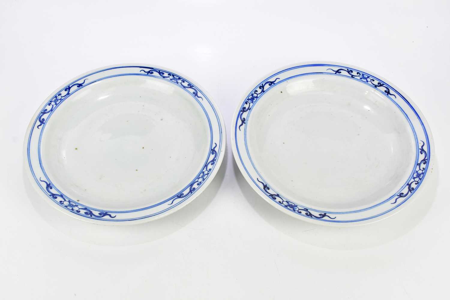 A pair of 20th century Japanese blue and white circular plates, diameter 38cm.