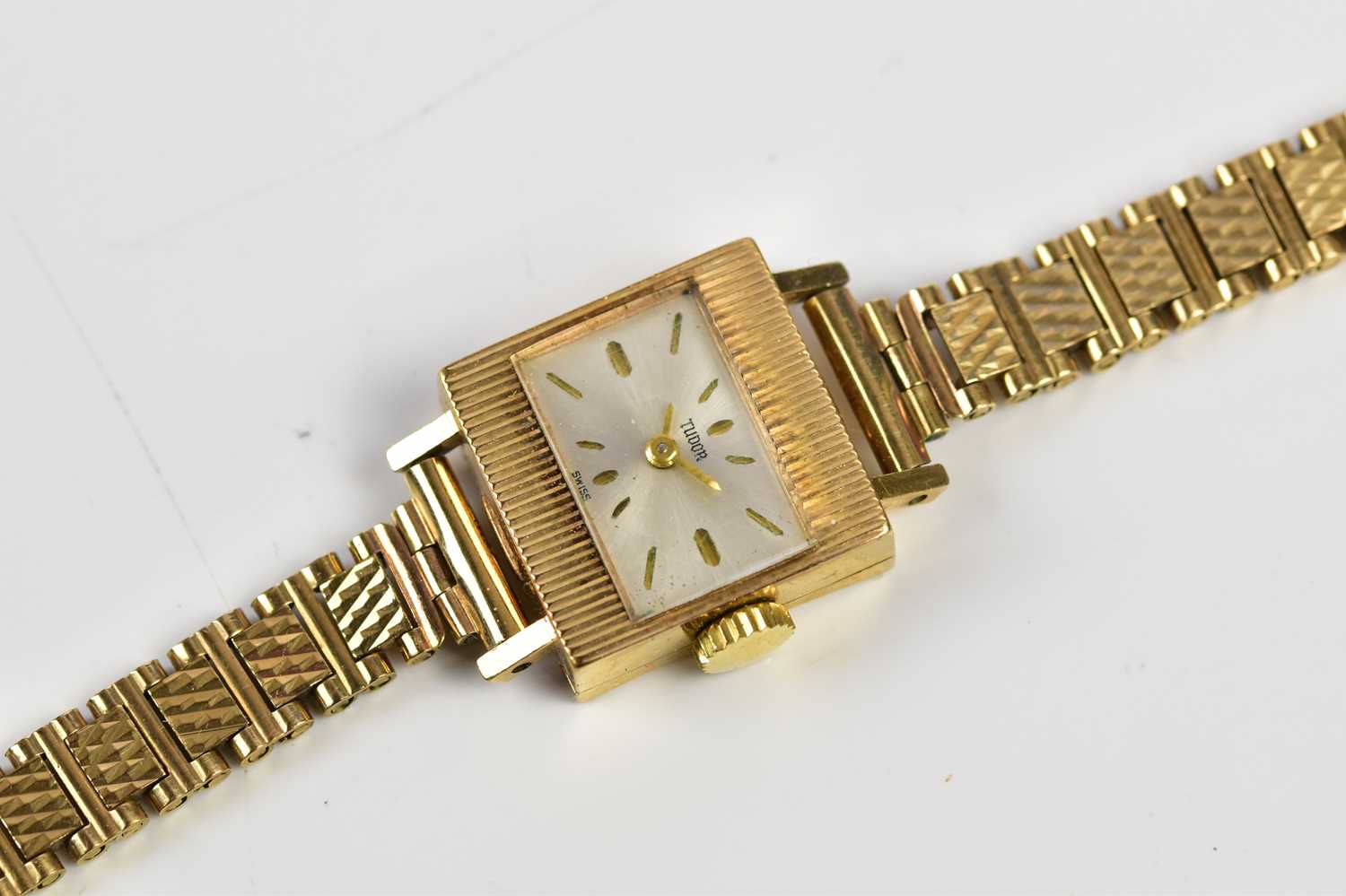 TUDOR; a lady's 9ct gold cased wristwatch, the dial set with batons, suspended on a 9ct gold - Image 2 of 4