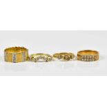 An 18ct yellow gold diamond set floral dress ring, approx size L, an 18ct yellow gold seven stone