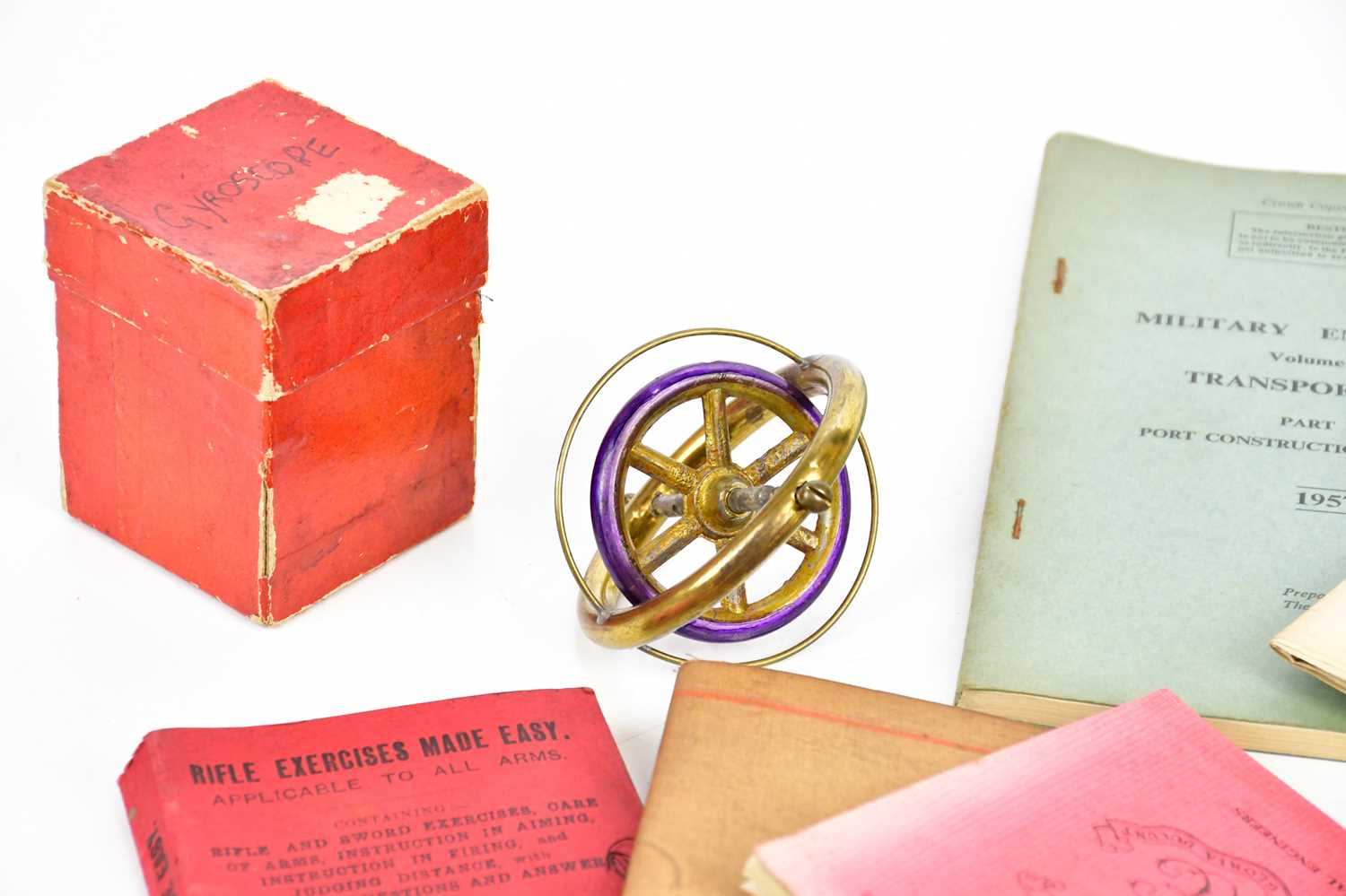 A collection of military cap badges, ephemera and a boxed gyroscope. - Image 3 of 3