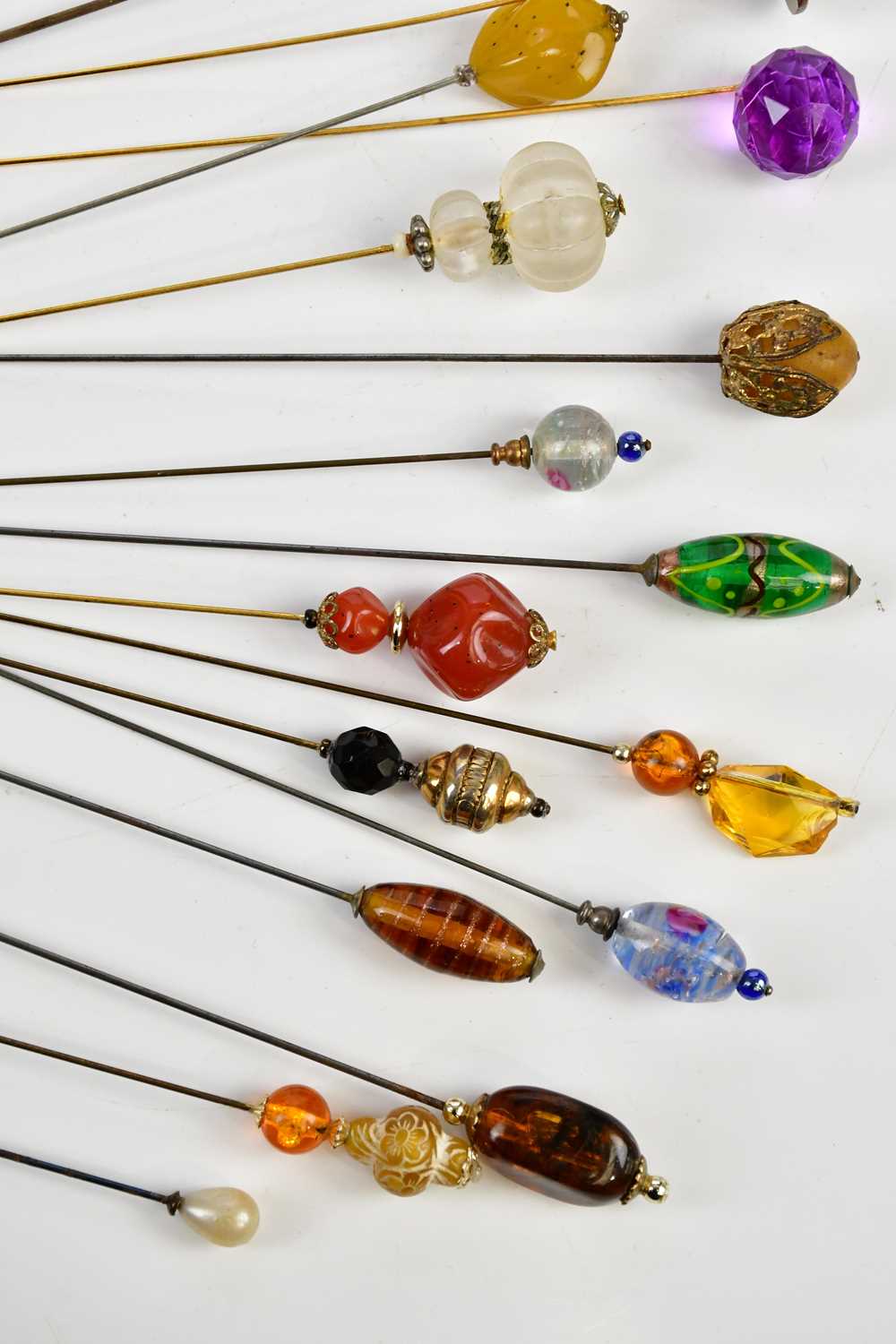 A good collection of hat pins, approximately twenty-five, including glass topped examples. - Image 4 of 4