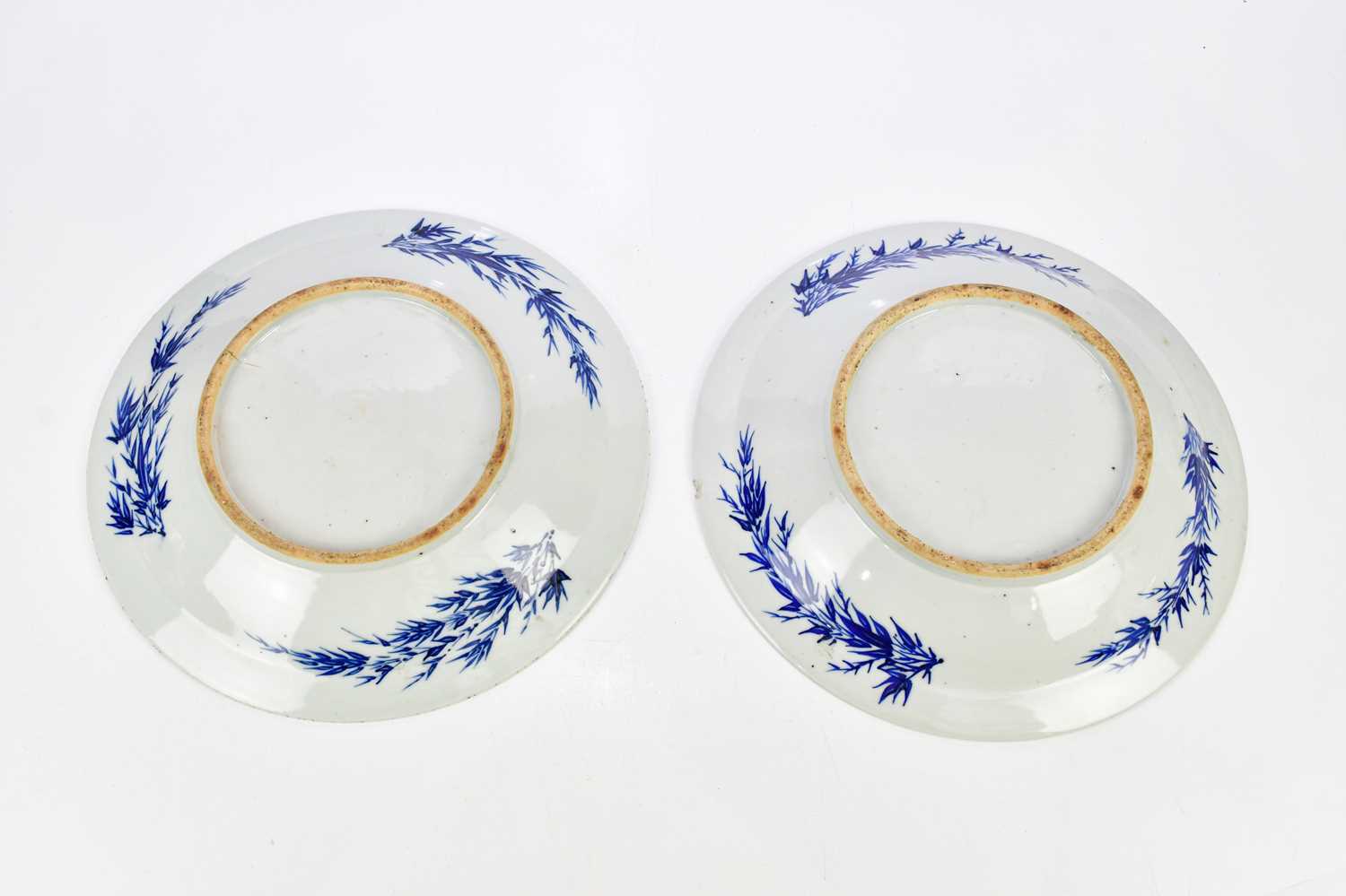 A pair of 20th century Japanese blue and white circular plates, diameter 38cm. - Image 4 of 6