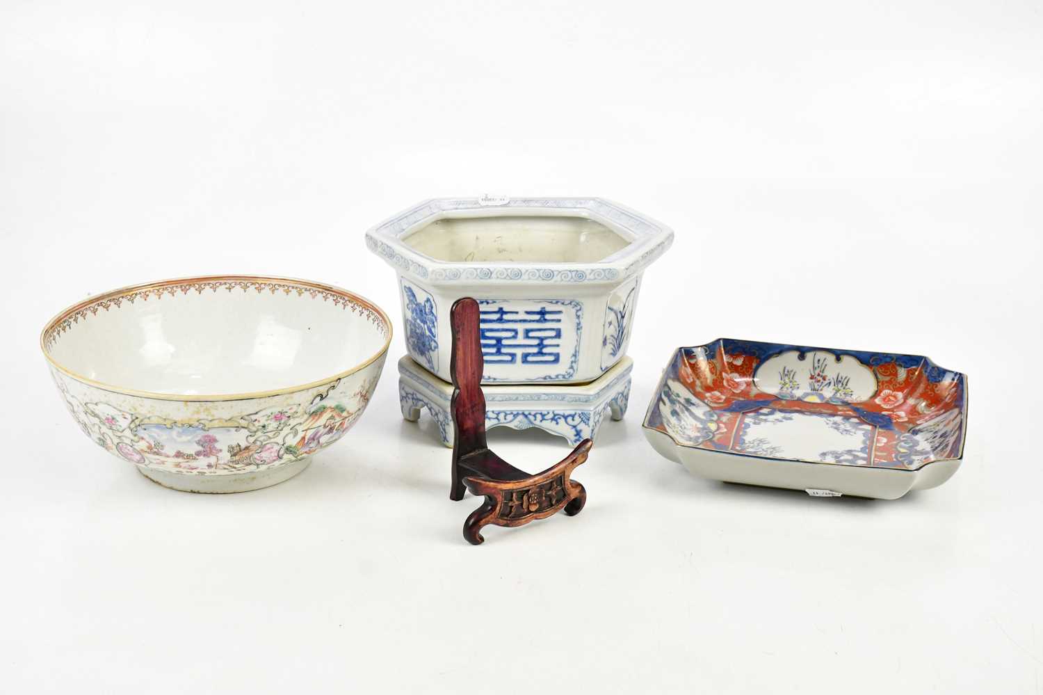 An 18th century Chinese Famille Rose Exportware footed bowl, decorated with elders and figures in