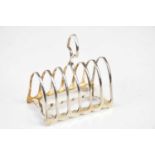 JAMES DIXON & SONS; a late Victorian hallmarked silver six division toast rack, Sheffield 1900,