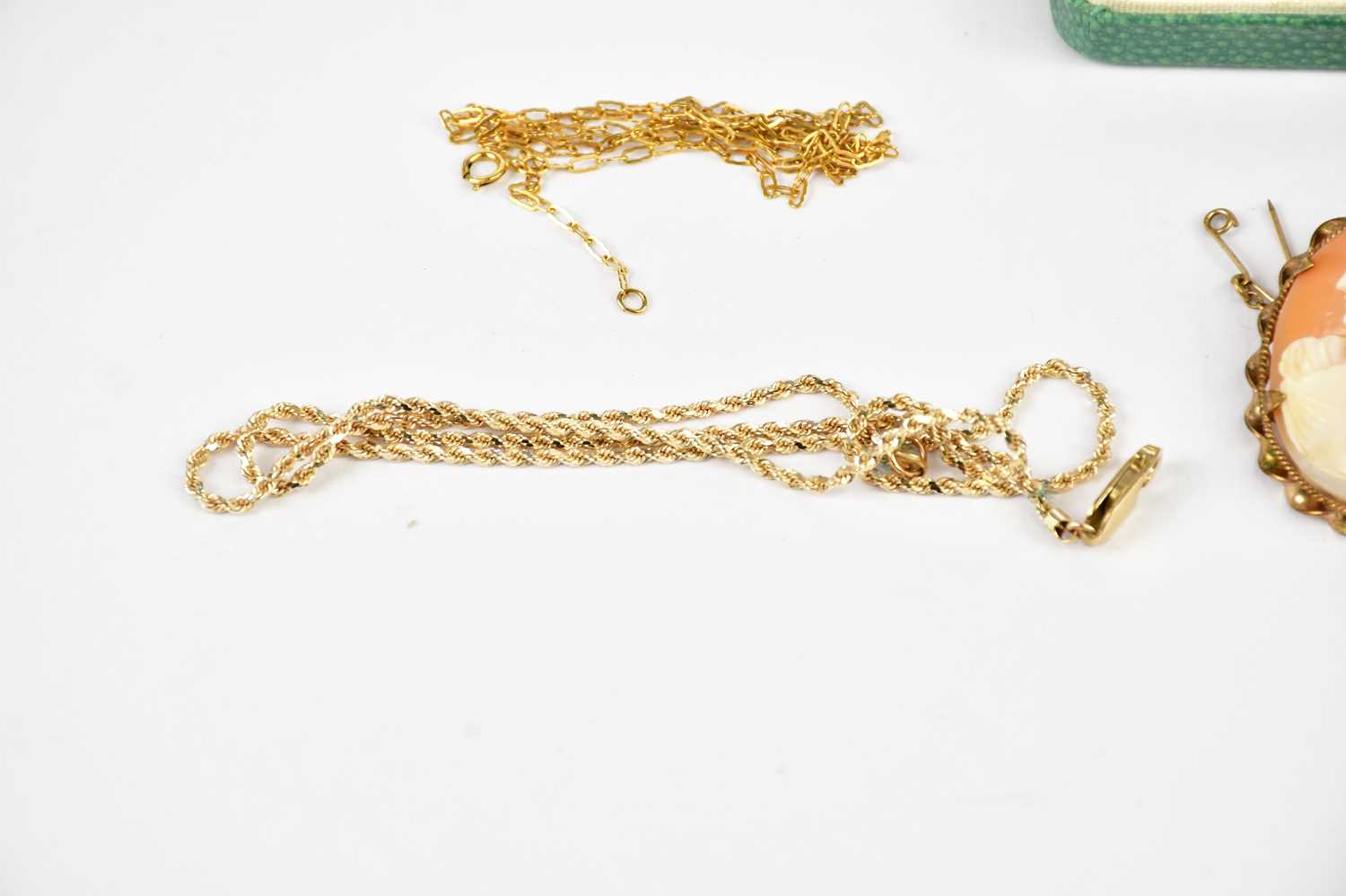 A 9ct rope twist necklace, a yellow metal curb link necklace, approx weight 4.9g, a pair of cameo - Image 2 of 4