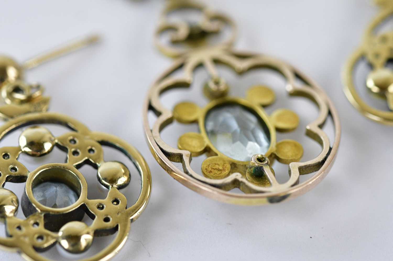 An Edwardian yellow metal pendant set with seed pearls and pale blue central stone suspended on a - Image 3 of 3